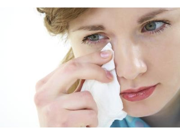 You should not experience any discharge, pain or change in your vision.