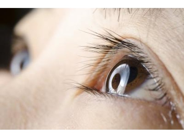 Close up of young boy's eyelid.