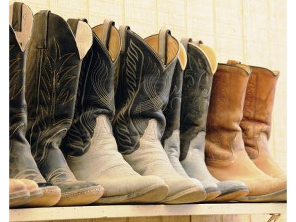 Shelf of dusty cowboy boots