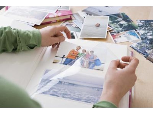 Man making scrapbook