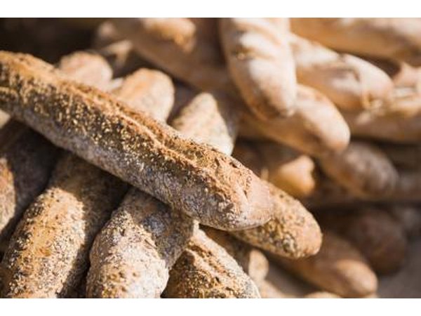 Baguettes for sale at a market.