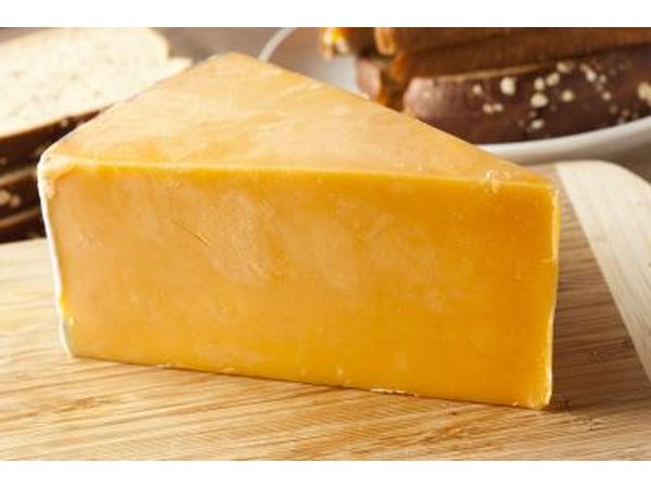 block of sharp cheddar cheese