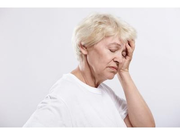 older woman feeling dizzy