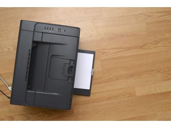 Printer on a wood floor.