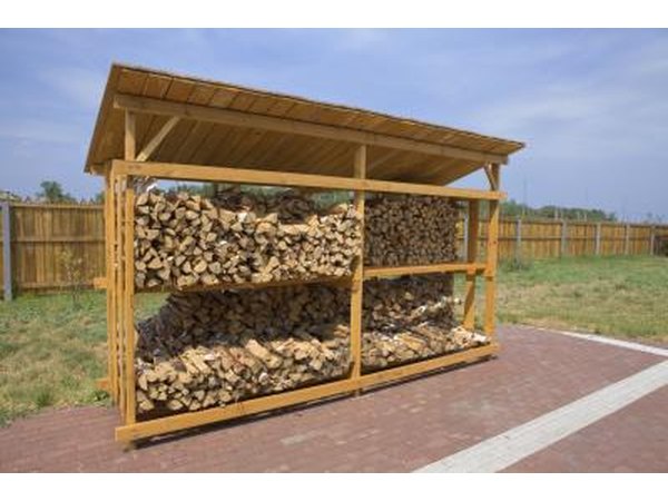 A firewood storage structure with angled roof.