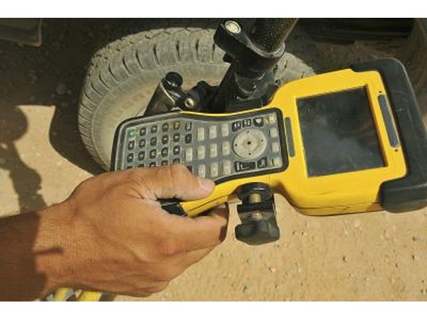 Man marking location on a GPS