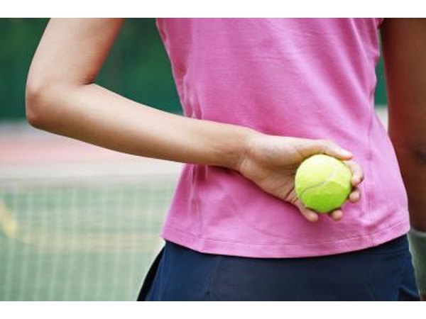 Put the tennis ball on the pressure points of the back.