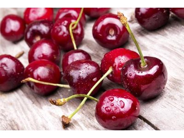 Cherries on table top.