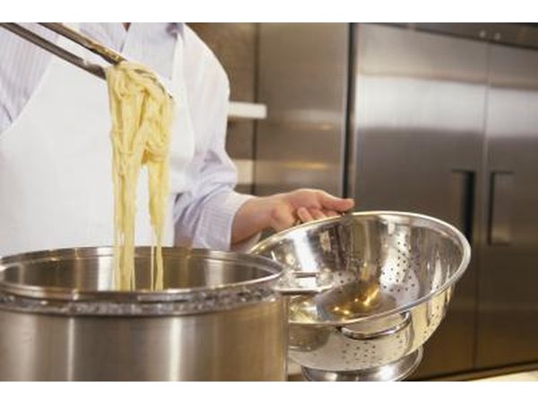 Husband cooking spaghetti