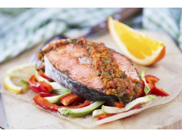 Smoked fish served over vegetables.