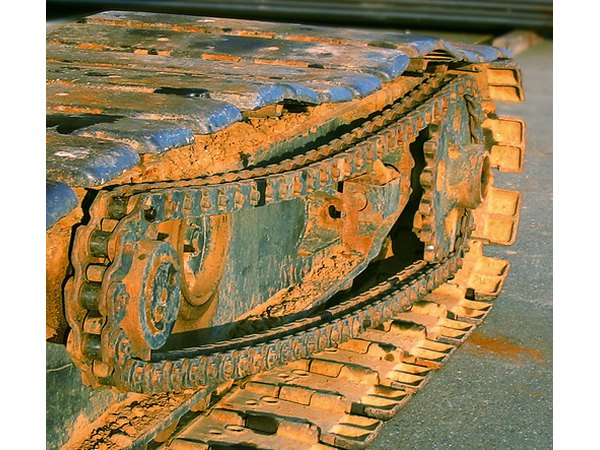 Although often dirty, bulldozer tires are built for handling debris and rough terrains.