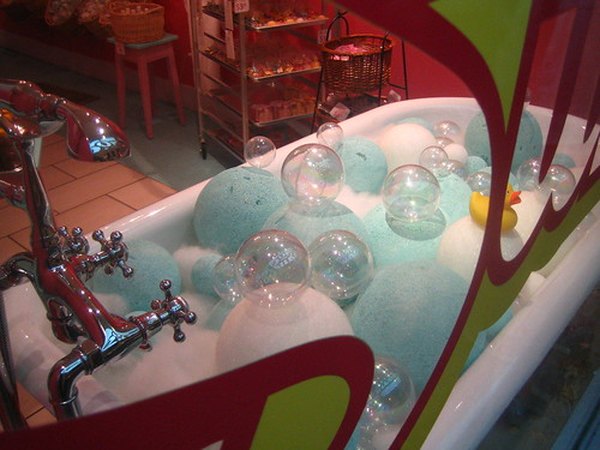 Tub full of bubbles and spheres.