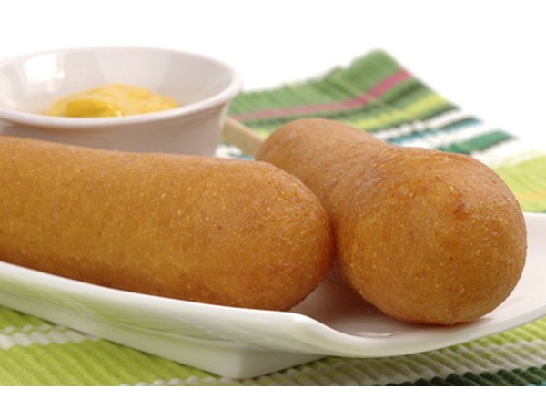 Andouille corndogs have secret creole spices to shake up your baseball party food selection.