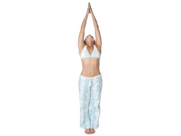Lift your arms overhead.