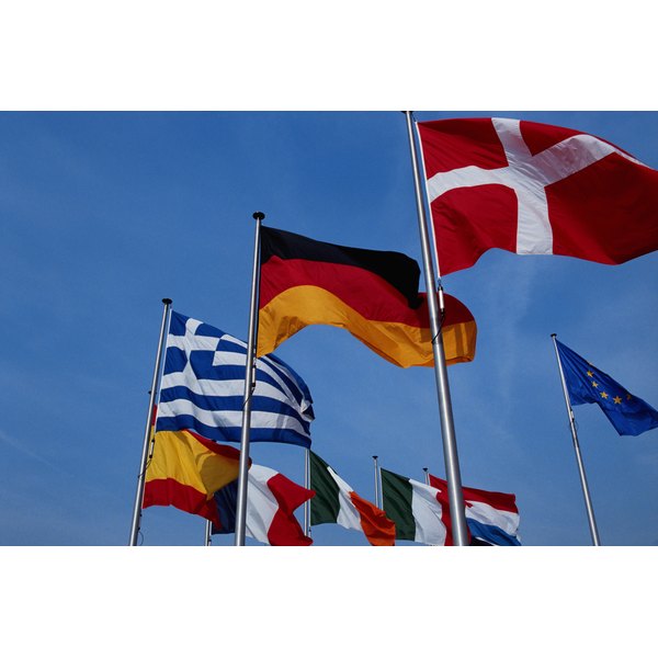 David De Lossy/Photodisc/Getty Images European community flags on poles