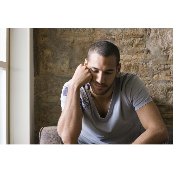 Jupiterimages/Polka Dot/Getty Images Depressed man