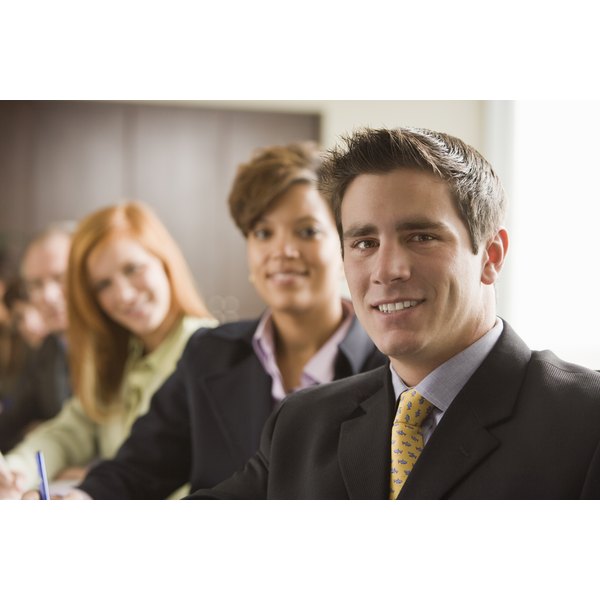 Jupiterimages/Comstock/Getty Images Businesspeople at conference table
