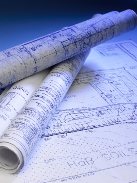 Creatas/Creatas/Getty Images Simple dog house plans don't have numerous steps.