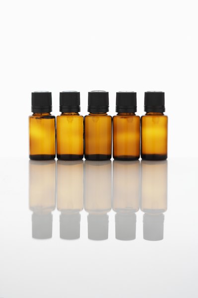Thomas Northcut/Photodisc/Getty Images Essential oils in your dog's shampoo makes her smell good and repel parasites.