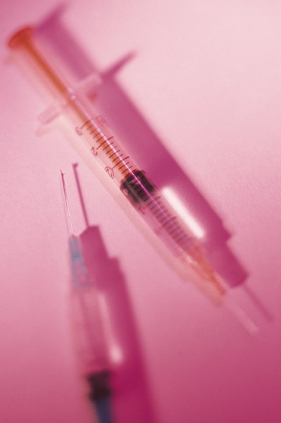 Comstock/Stockbyte/Getty Images The distemper vaccine is crucial to your dog's health.