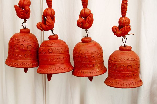 Visage/Stockbyte/Getty Images Help your puppy communicate his needs by hanging a bell on the door.