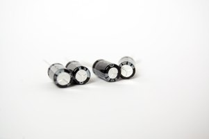 Can you hook up 2 amps to 1 capacitor