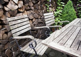 How do you clean outdoor wooden furniture?