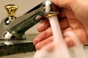 Turn off the water supply before removing sink mixer taps.