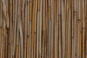 How do you install a bamboo-reed fence?
