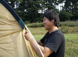 The TimberTop tent uses poles to support the fabric.