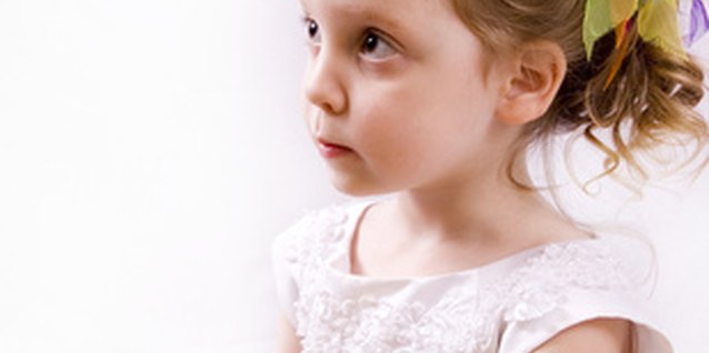 preschooler with a book image by Lisa Eastman from Fotolia.com Host a party that celebrates the curiosity of your preschooler.