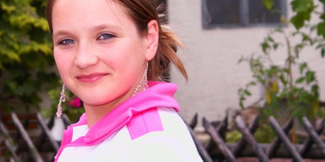 girl, radiant eyes. image by Allisija from Fotolia.com Some women claim that luxury creams are worth the money.