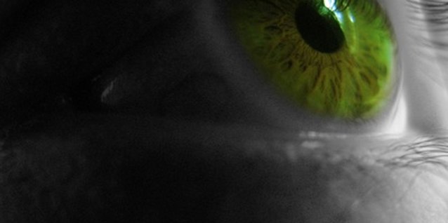 eye green image by Bosko Martinovic from Fotolia.com Protect your color contacts by using proper cleaning techniques.