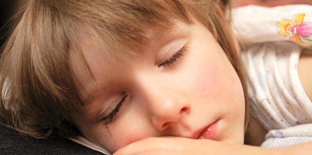 the girl sleeps image by Arkady Chubykin from Fotolia.com If you insist on quiet time for a reluctant toddler, she'll usually fall asleep.