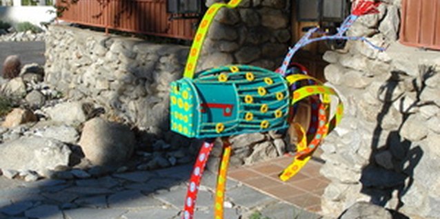 Palm Springs Mailbox image by katseye from Fotolia.com Get creative with your mailbox.