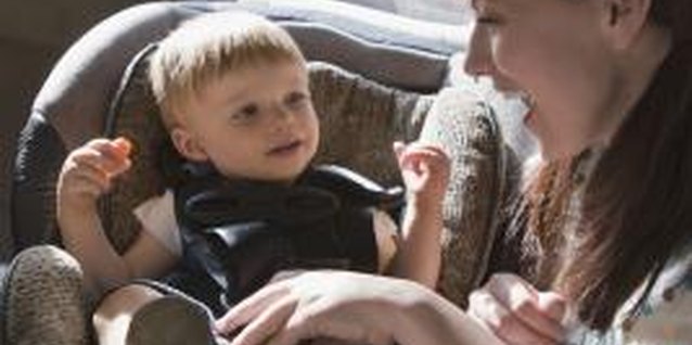 Thinkstock Images/Comstock/Getty Images Buckle him in tightly before a ride in a taxi.