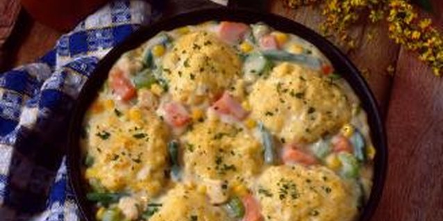 Jupiterimages/Comstock/Getty Images Southern-style chicken and dumplings and a variety of healthy vegetables.