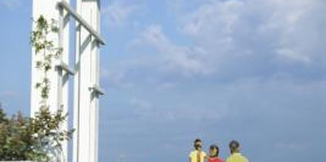 Thinkstock/Comstock/Getty Images Pergolas are a place for stopping and enjoying the outdoor environment.