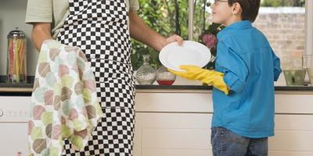 Jupiterimages/Polka Dot/Getty Images Most kids are willing helpers around the house.