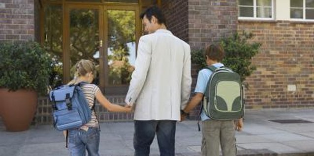 Jupiterimages/Pixland/Getty Images Single parents take great care to be there for their children.
