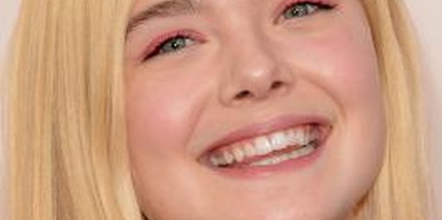 Jason Merritt/Getty Images Entertainment/Getty Images Teen actress Elle Fanning wears her hair long and blonde.