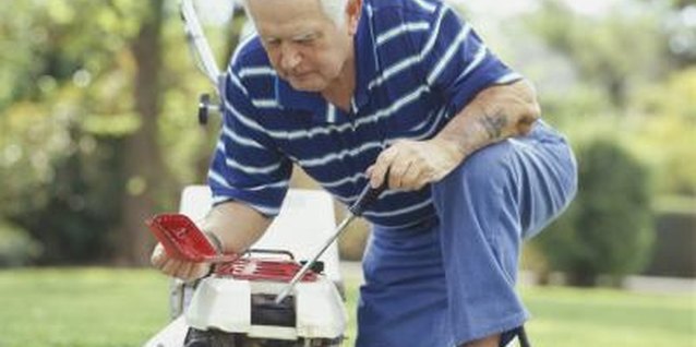 Steve Mason/Photodisc/Getty Images Electric and gas mowers differ greatly in maintenance requirements.
