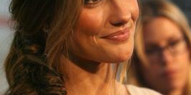 Valerie Macon/Getty Images Entertainment/Getty Images Actress Minka Kelly wears a fishtail braid in a messy style.