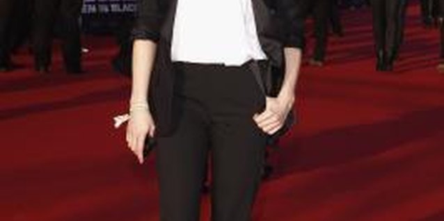 Andreas Rentz/Getty Images Entertainment/Getty Images Natalia Avelon playfully mixes Converse sneakers with a tuxedo style suit.