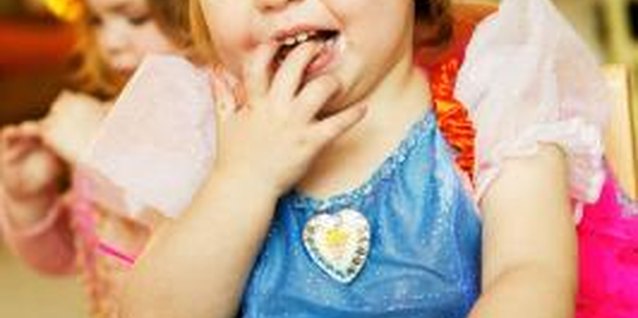 Jupiterimages/Photos.com/Getty Images Catch your toddler thoroughly enjoying her birthday party.