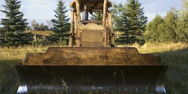 Jupiterimages/Comstock/Getty Images Bulldozer crafts can trample afternoon boredom.
