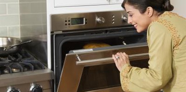 Creatas Images/Creatas/Getty Images Placing chicken strips on a hot sheet tray makes them especially crispy.
