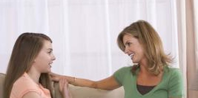 Jupiterimages/Comstock/Getty Images Listening without judgment is key to keeping communication open.