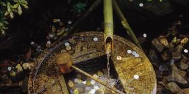 Comstock/Comstock/Getty Images A water feature can be one of several meditation focal points in your chakra garden.