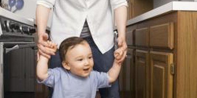Jupiterimages/Creatas/Getty Images Make your tile floor level and safe for your young explorer.